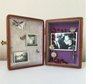 "Sweet Memories"Mixed media assemblage (4 ¼” x 5 ½” x 2”). Exterior – cigar box, walnut stain - silver label. Interior – silver leaf & laminated chenille - personal mementoes – reproduction prints