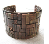 Woven cuff with stitching Copper, new gold, nickel, silver rivets, galvanized wire